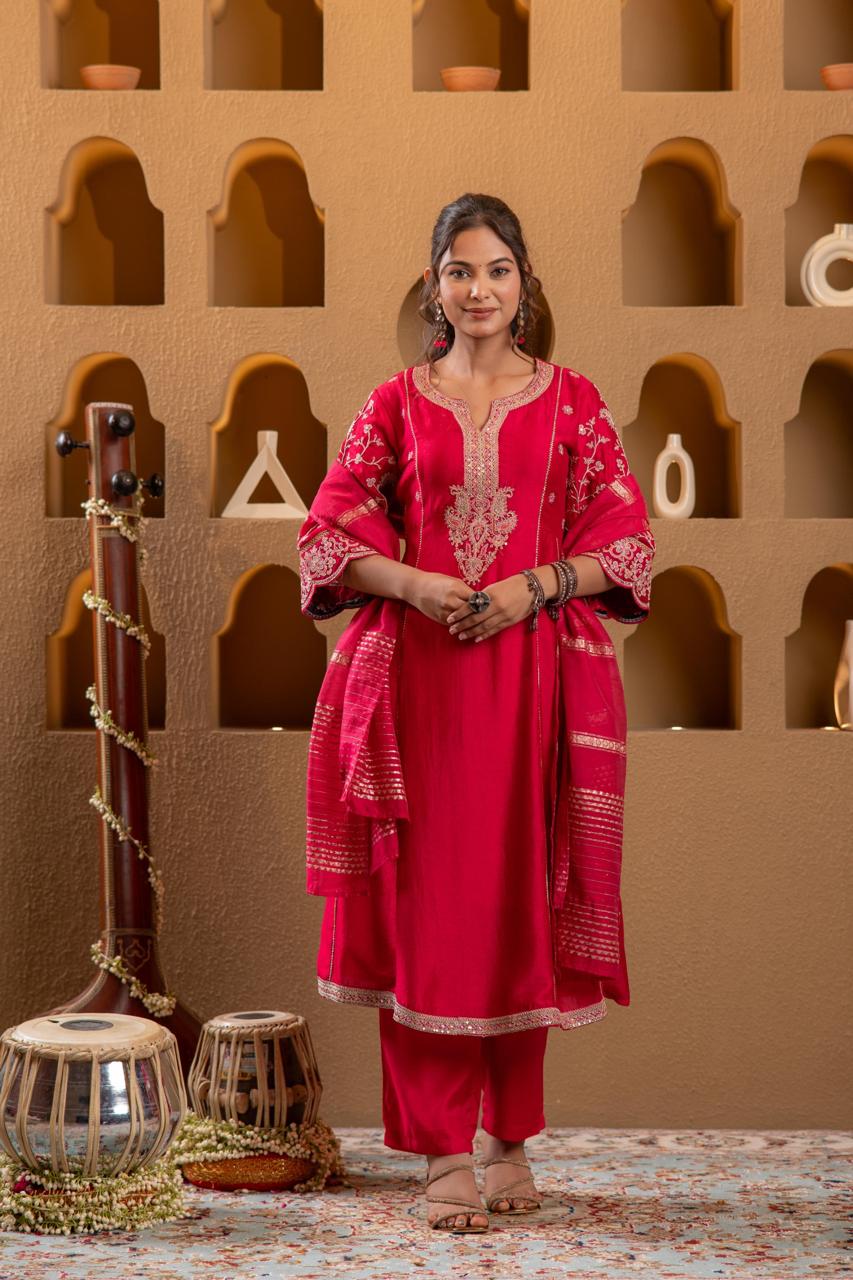 Front facing pose of rani pink Viscose Silk kurta set with gold paisley embroidery and zari dupatta, warm studio lighting - Jagranee
