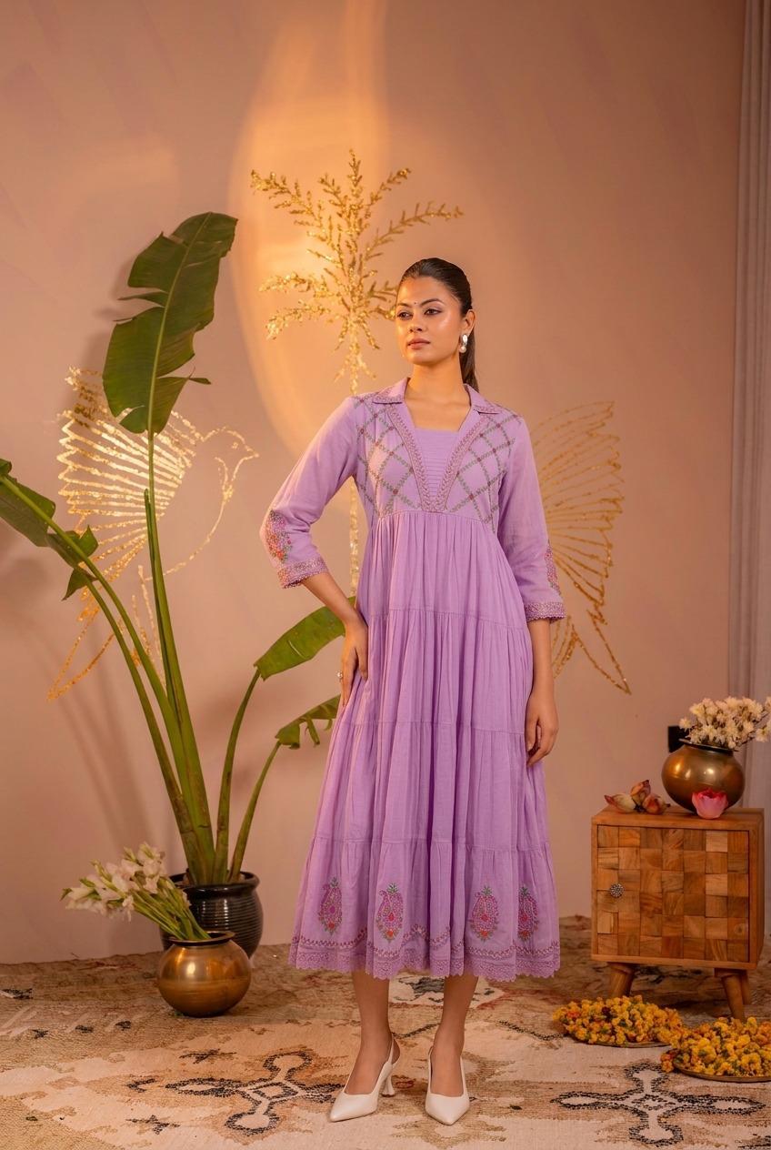 Full body front view of lavender embroidered tiered midi dress with collar neck and paisley sleeve motifs - Jagranee