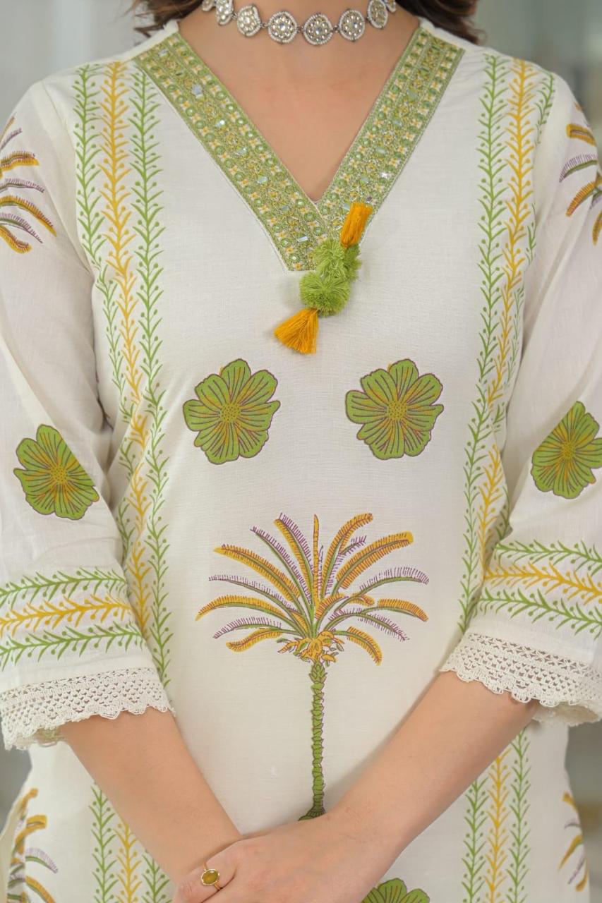 Close-Up of Gota Patti V-Neckline with Mustard Tassel and Hand Block 
Print Palm Motif on Ivory Pure Cotton Kurta — Jagranee Jaipur