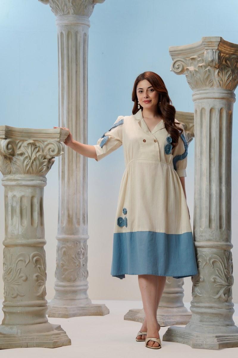Ivory Blue Horizon Midi Dress — Side Leaning Pose Against Columns 
Showing Full Silhouette and Crochet Details — Jagranee Jaipur