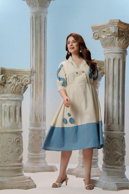Ivory Cotton Linen Midi Dress with Blue Crochet Rosettes and 
Colour Block Hem — Three Quarter Graceful Pose — Jagranee Jaipur