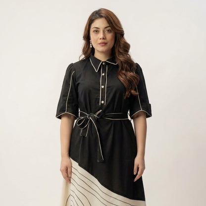 Close-Up of Black Cotton Midi Dress Showing Pointed Collar, 
Contrast Ivory Piping, Pearl Buttons and Tie Belt — Jagranee Jaipur