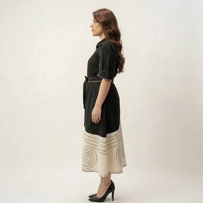 Side Profile of Black Ivory Colour Block Belted Midi Dress 
Showing Full A-Line Silhouette and Diagonal Colour Block — Jagranee Jaipur