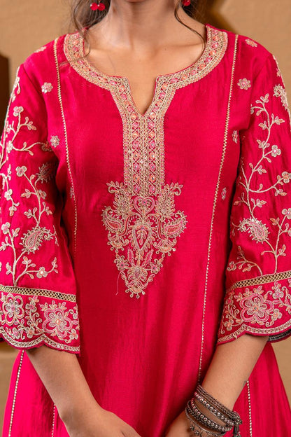 Close-up detail of gold paisley floral embroidery on yoke and notch neckline of rani pink Viscose Silk kurta - Jagranee