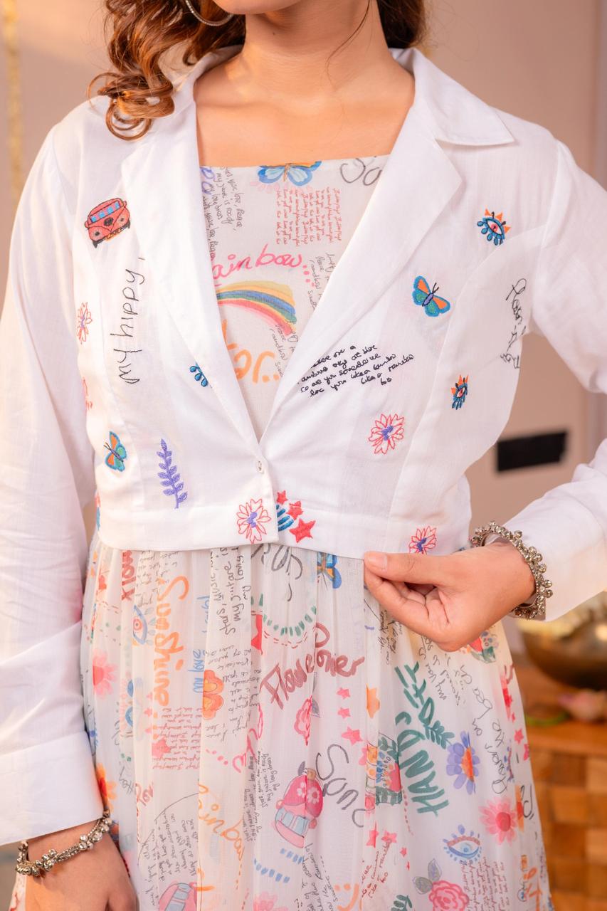 Close-up detail of embroidered butterfly, rainbow and floral motifs on cropped blazer and doodle print chiffon dress - Jagranee