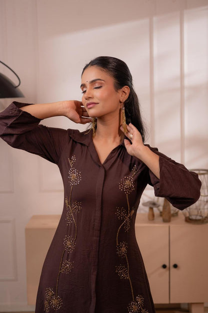 Close-up of gold sequin dandelion embroidery and collar detail on dark brown crepe kurta, candid pose - Jagranee