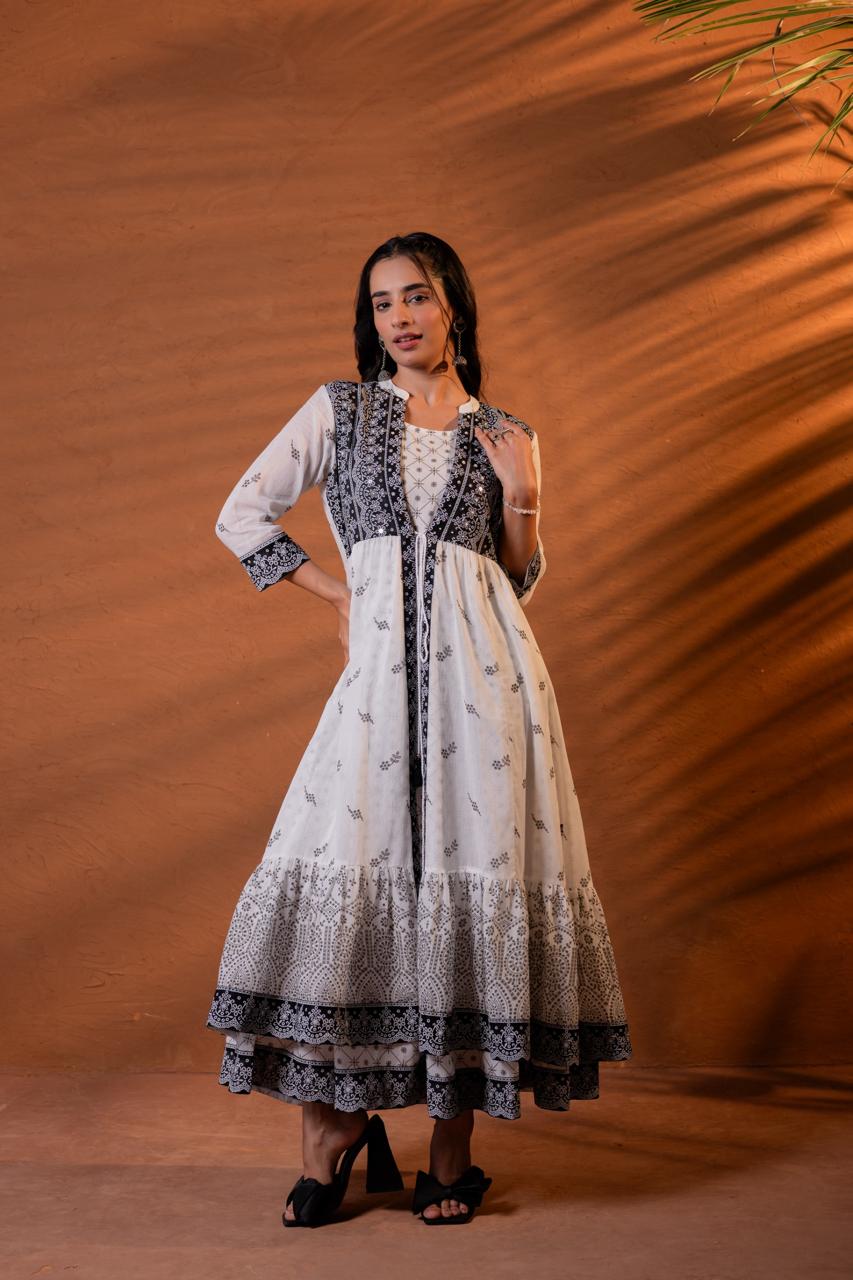 Front view of black and white block print Anarkali dress with mirror work bodice panels and tassel tie-up - Jagranee